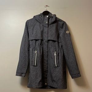 This is a grey rain coat.